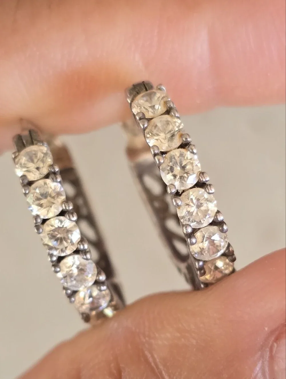Elegant channel set sparkling CZ diamonds half filigree hoop earrings